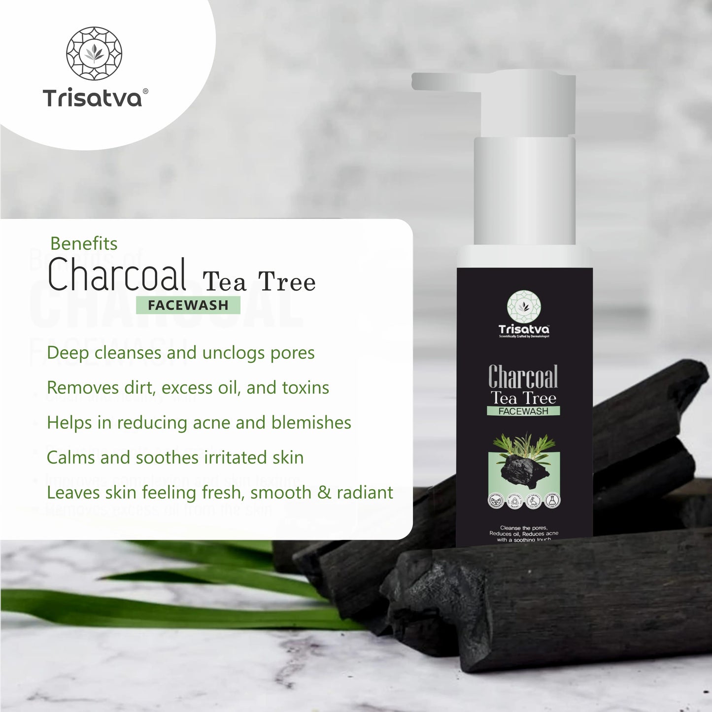 Trisatva Charcoal Tea Tree Facewash bottle on charcoal pieces with skincare benefits text