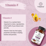 Trisatva Vitamin E supplement bottle with benefits for vision, skin, brain, and anti-aging on pink background