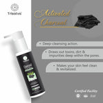 Trisatva Charcoal Tea Tree facewash bottle with activated charcoal benefits and skincare claims on gray background