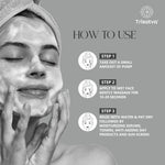 Close-up of woman cleansing face with foam, skincare routine steps for Trisatva face wash