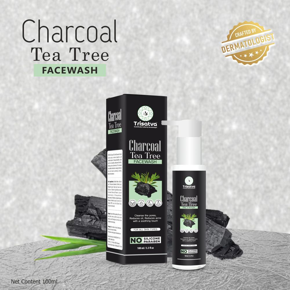 Trisatva Charcoal Tea Tree Facewash bottle and box with charcoal and green leaves, dermatologist crafted